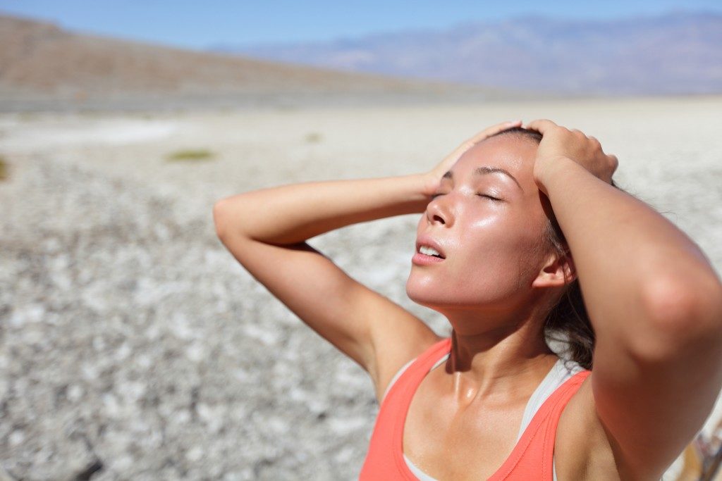 woman suffering from heat stress
