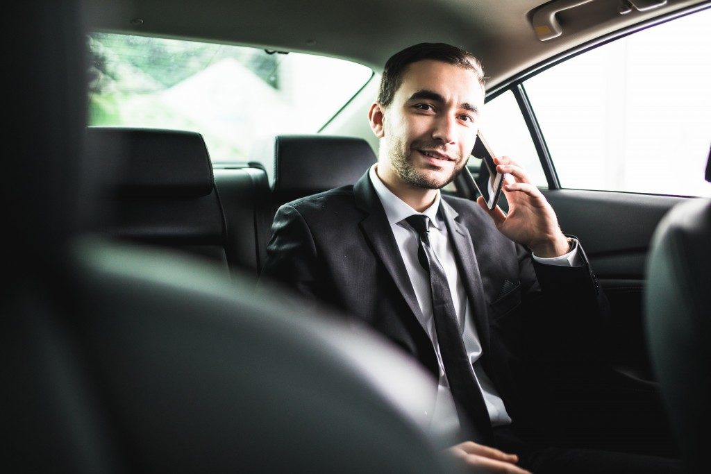 Businessman riding an uber