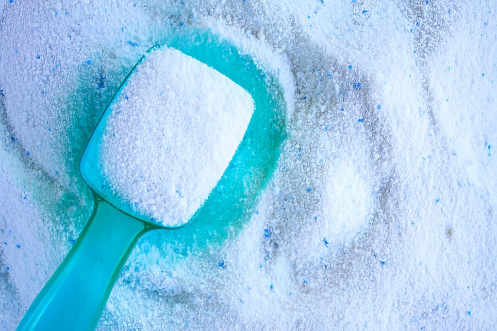 blue scoop with laundry detergent